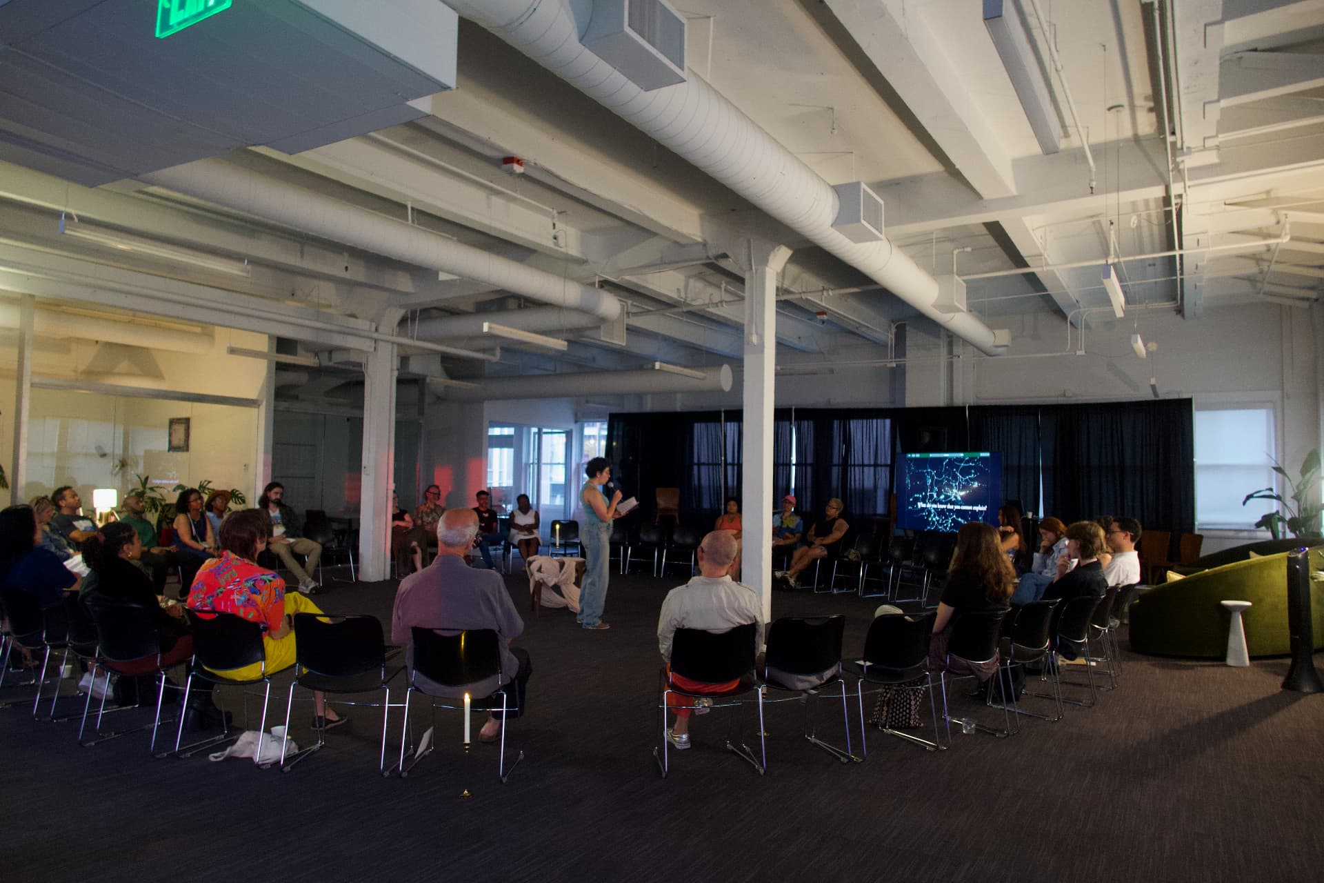 Wide view of the room during the reading